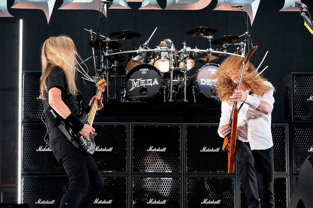 The band Megadeth playing at a concert