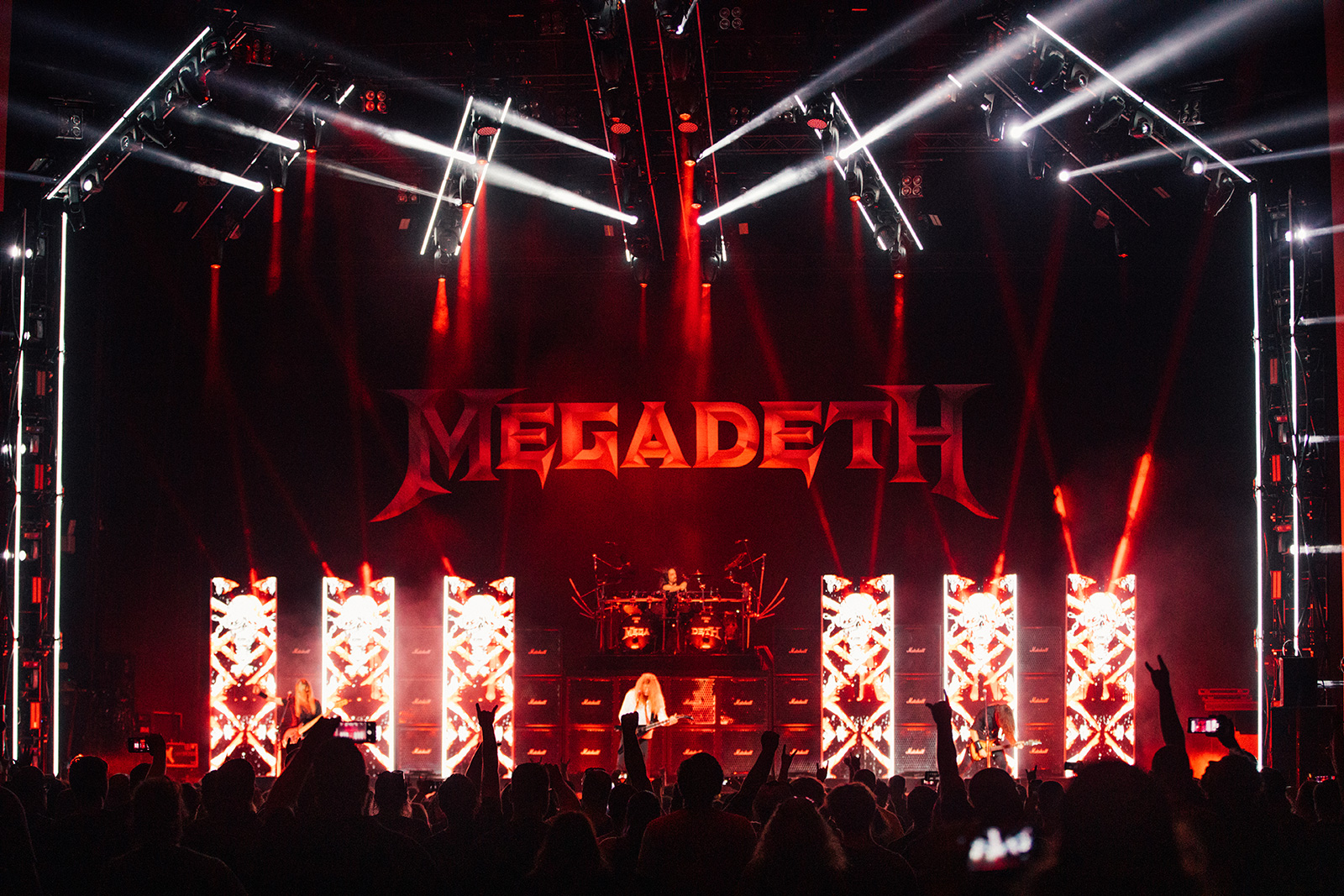 The band Megadeth playing at a concert