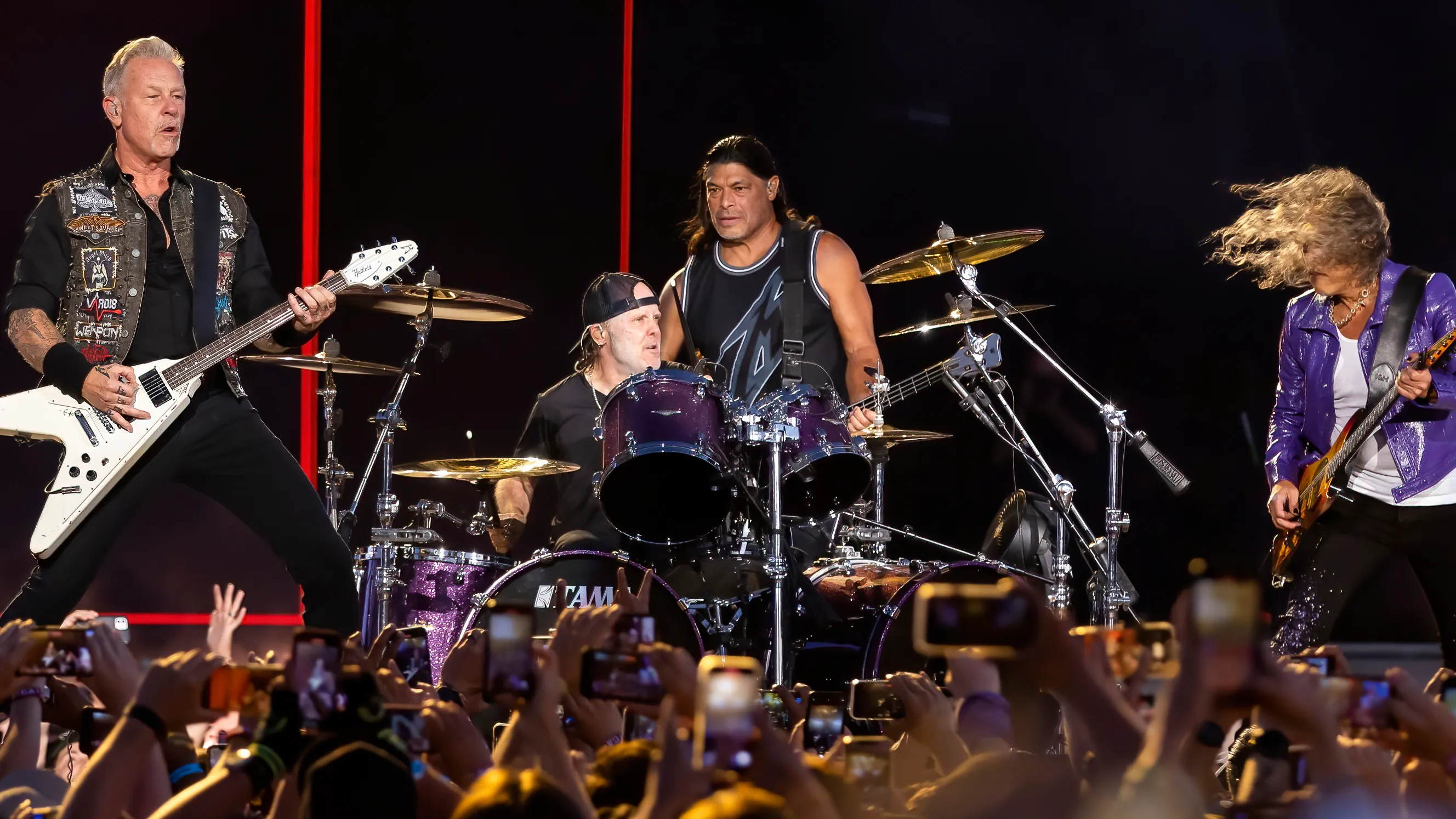 The band Metallica playing at a concert