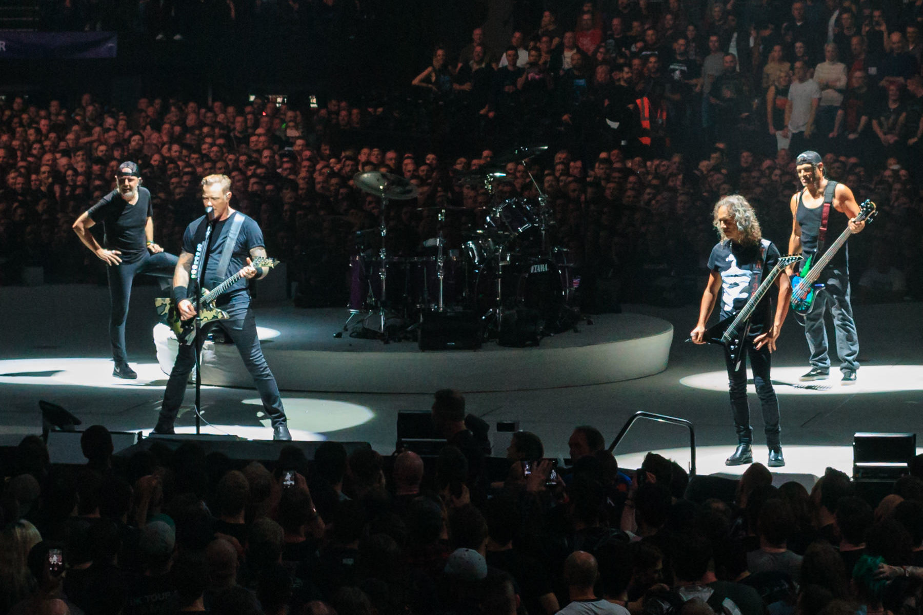 The band Metallica playing at a concert